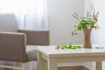summer flowers in vase on table