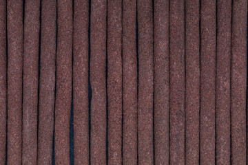 Fototapeta premium Close-up of Tibetan incense sticks (red-sandalwood). Incense texture.