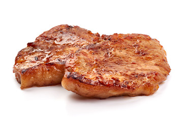 Baked juicy pork steak, isolated on white background