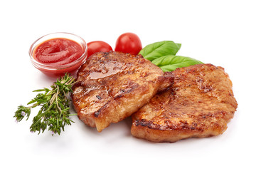 Fried juicy pork steak, isolated on white background
