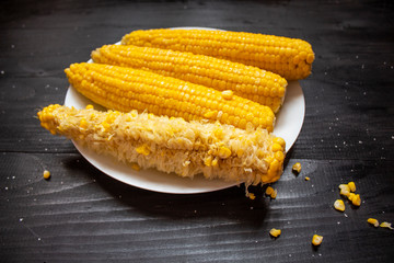 Grains of ripe corn. sweet corn. Corn on the cob, the food is ripe, juicy, delicious corn. Photo of corn background. Fresh young sweet corn on cobs, closeup.