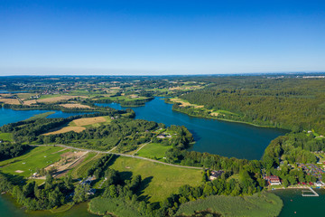 Aerial view of Kashubian Landscape Park. Kaszuby. Poland. Photo made by drone from above. Bird eye view.