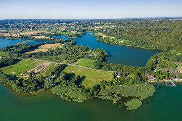 Aerial view of Kashubian Landscape Park. Kaszuby. Poland. Photo made by drone from above. Bird eye view.