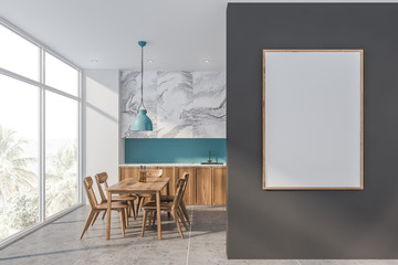 White marble and blue kitchen with poster