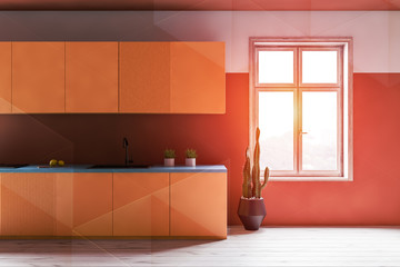 Orange kitchen interior with yellow countertops