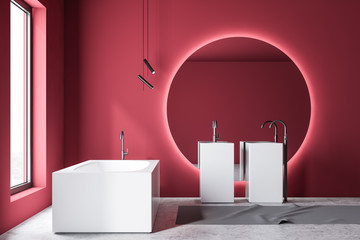 Red bathroom interior with bathtub and sink