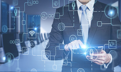 Man working with tablet in meeting room, internet