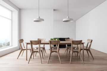 Fototapeta premium White dining room with wooden table