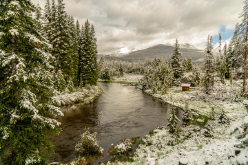 An alpine river soon after a summer snow storm with fresh snow on the grass and cloudy sky 3, Colorado River, Colorado