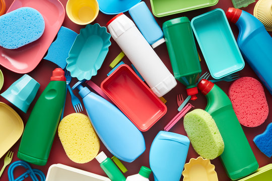 Plastic utensils in heap.