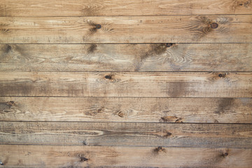 Old brown wood background made of dark natural wood in grunge style. The view from the top. Natural...
