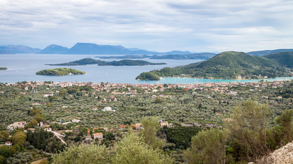Fototapeta na wymiar Blick von Lefkada auf Nydri und die Inseln Sparti Lefkados, Skorpios und Madouri