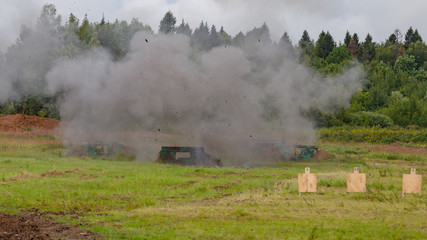 Fototapeta na wymiar Blast from a rocket launcher shot in the field