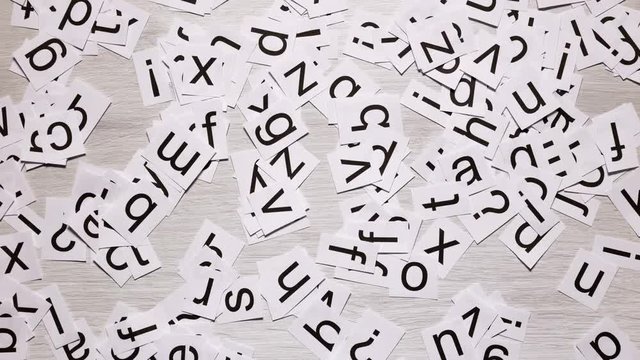 Stop Motion Of Letters That Form The Question "What?"