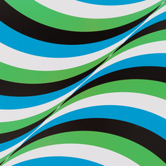 Closeup of Factory panel with a pattern of multi-colored lines flowing into one another. Abstract background of intersecting colored lines.
