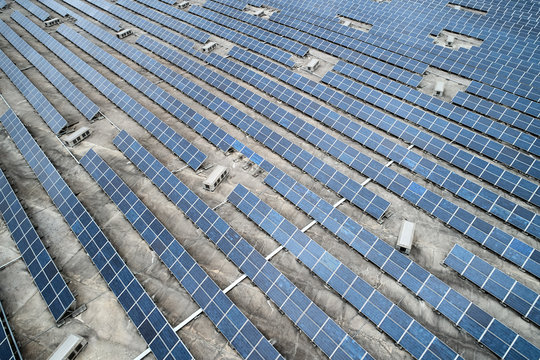 Alternative source of energy. Solar batteries in rows.