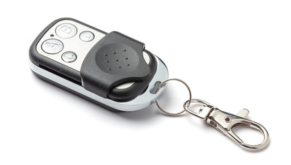 Remote control barrier gate garage. Infrared remote or bluetooth keychain. Isolated on white...
