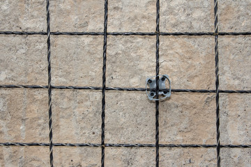 Support for the reinforcement grid. Materials for concrete work.