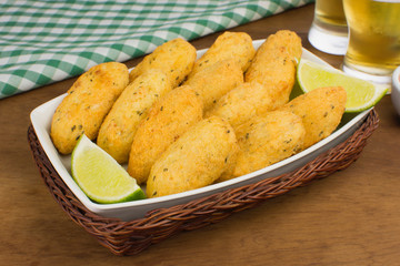 Traditional recipe codfish balls in woodbackground