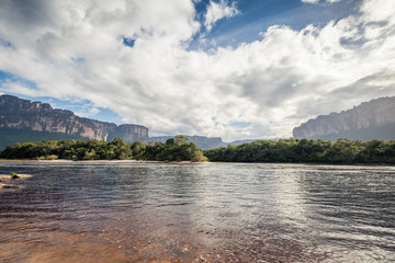 View of Canaima National Park tepuis and the Carrao river at Mayupa island. 