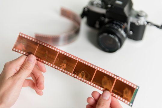 Woman holding film negatives