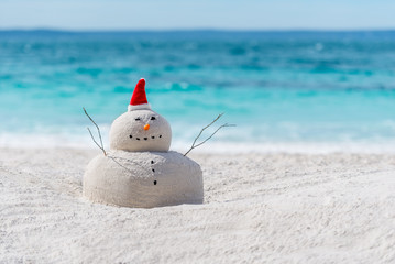 Australian Christmas Sandman on a beautiful white sand beach © fogaas