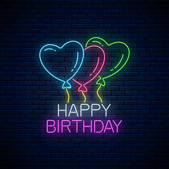 Happy birthday glowing neon sign colorful balloons. Birthday balloons celebration symbol in neon style.