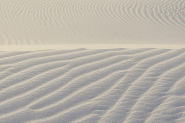Sand texture background. Creme tint.