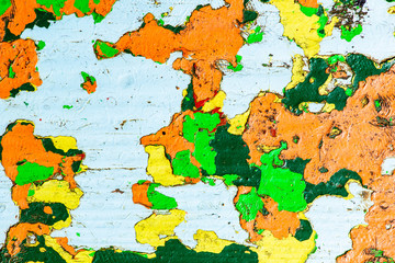 park benches with worn paint forming different colors, textures and shapes painting photography