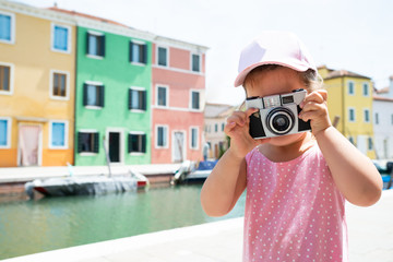 Girl Taking Photo With Camera At Burano Island