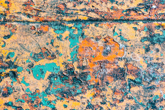park benches with worn paint forming different colors, textures and shapes painting photography © druso