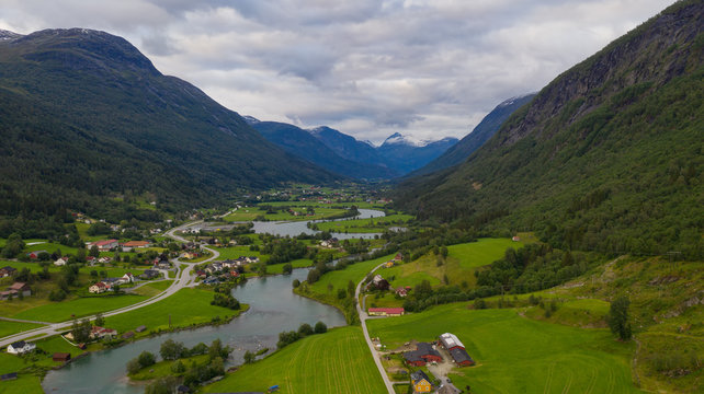 Sunset over river Stryneelva and Loen village at Stryn, Norway, july 2019.