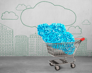 Big data and cloud computing concept. Shopping cart with cloud of blue letters and numbers, side view, on cityscapes doodles of concrete wall background.
