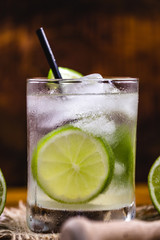 Caipirinha cocktail, close up. Traditional brazilian cocktail made with cachaça, sugar and lemon.