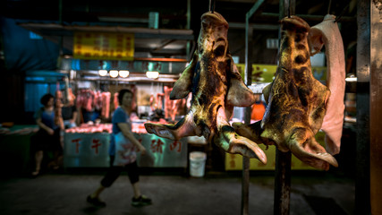 Raw Pig Face Hanging On Hook. Traditional Food Selding In Taiwan Market