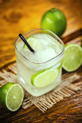 Caipirinha cocktail, close up. Traditional brazilian cocktail made with cachaça, sugar and lemon.