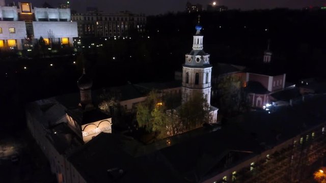 Aerial night shot of Andreevsky Monastery situated among Moscow Vorobyovy Hills, Russia