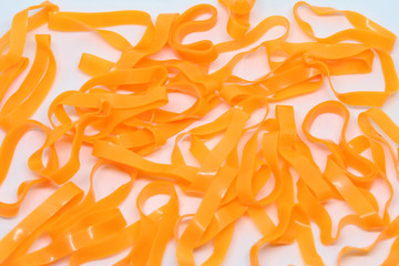 Elastic rubber bands on a white background.