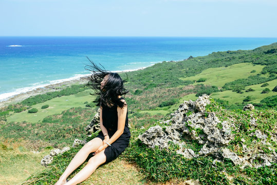 girl having fun at Longpan Park, Kenting, Taiwan