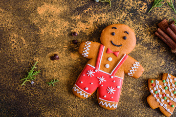 Christmas homemade gingerbread cookies on a dark background