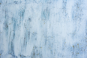 Texture of a concrete wall with cracks and scratches which can be used as a background