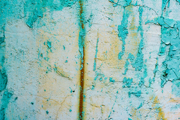 Texture of a concrete wall with cracks and scratches which can be used as a background