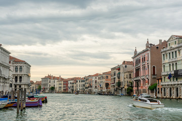 Grand canal in Italian Venice during cloudy twilight 