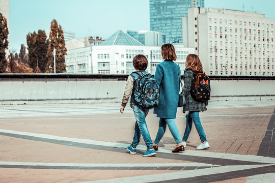 Active children going home after school classes - Powered by Adobe