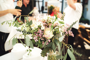 Floral table centerpiece at a wedding reception