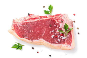 Fresh beef meat is ready for frying in a grill pan. isolated on white background