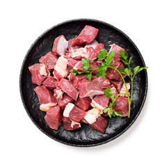 Raw chopped beef meat with spices. isolated on white background