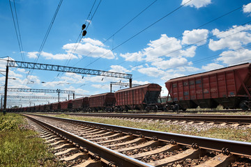 Industrial railway - wagons, rails and infrastructure, electric power supply, Cargo transportation and shipping concept.