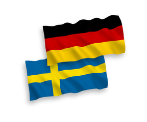 Flags of Sweden and Germany on a white background
