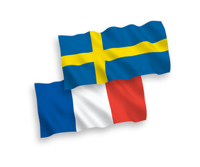 Flags of France and Sweden on a white background